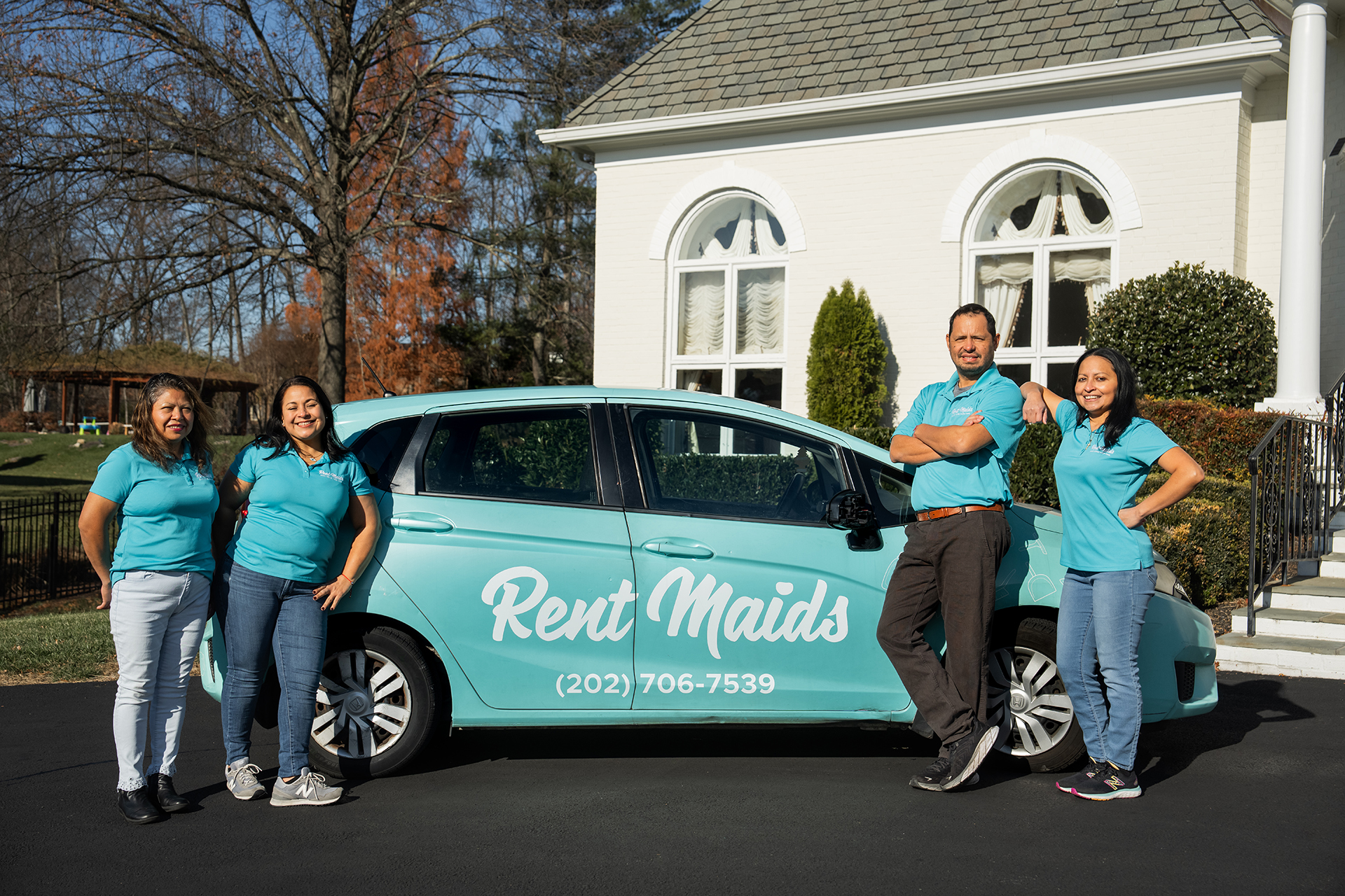 Rent Maids Team Photo with Car
